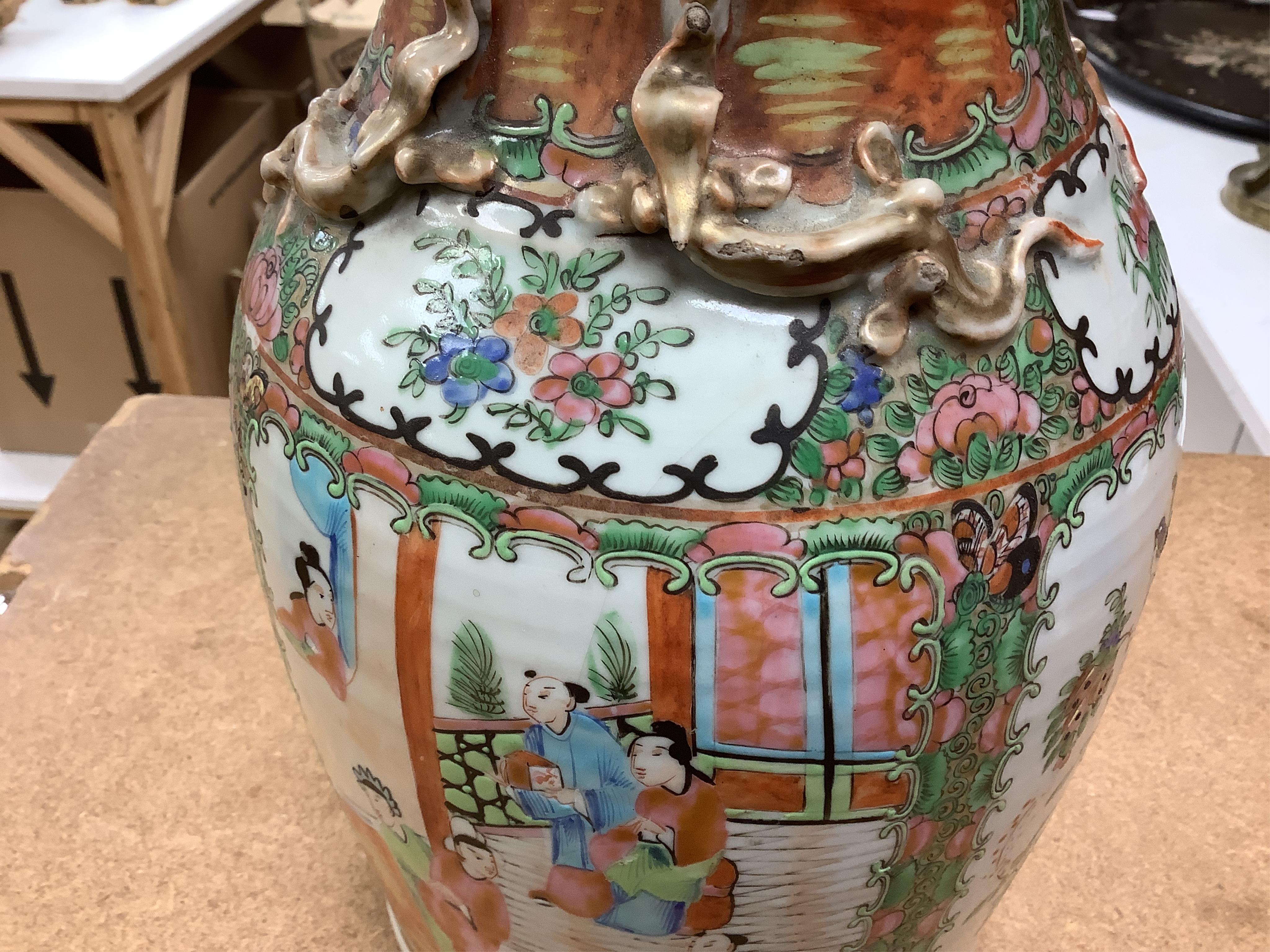 A 19th century Chinese famille rose vase, 33.5cm. Condition - poor to fair